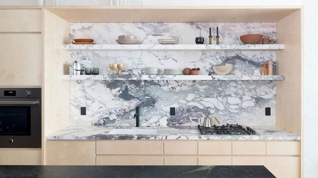 Eight textural kitchens that combine stone and wood surfaces