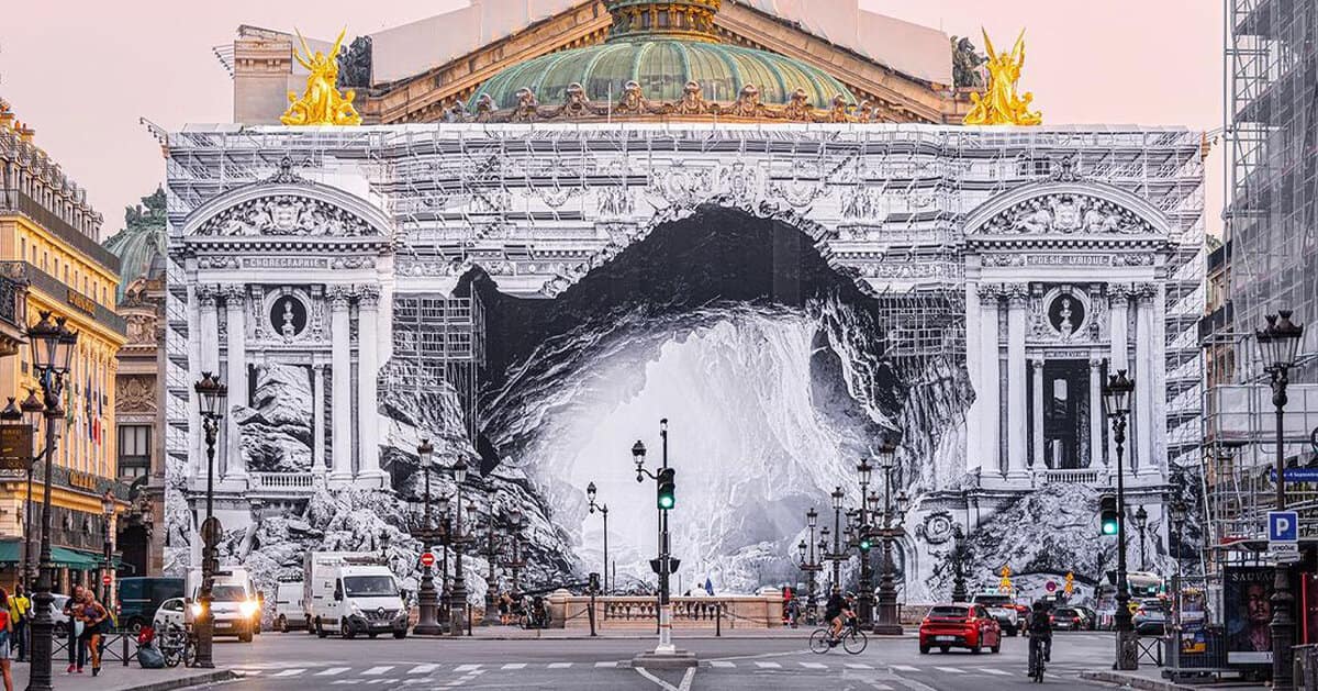 JR reimagines the scaffolding of paris’ opera house as the entrance to a vast cave