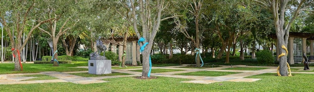 "Tree Huggers" 2022. The Society of the Four Arts Museum and Gardens. Palm Beach, FL. Sculptures made with outdoor fabric. Hand embroidered.