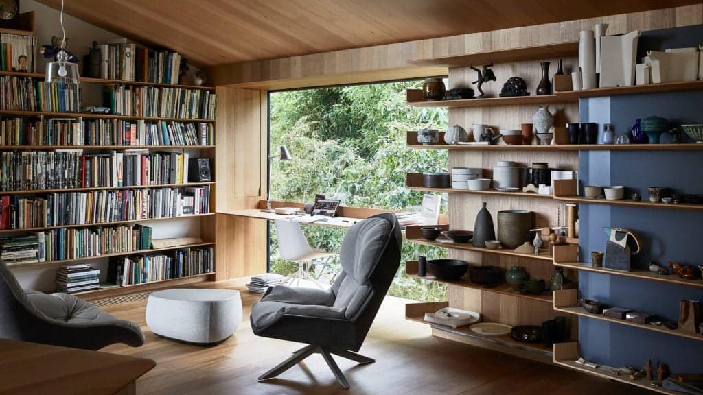 Eight interiors celebrating the curated clutter of "bookshelf wealth"